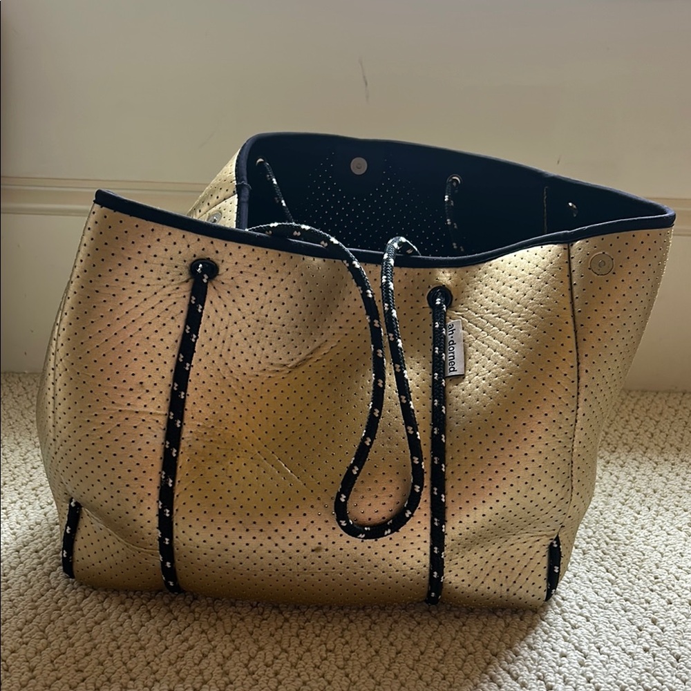 AHDORNED gold tote bag